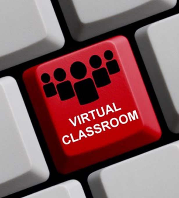 Een rode toets op een toetsenbord waar virtual classroom opstaat.